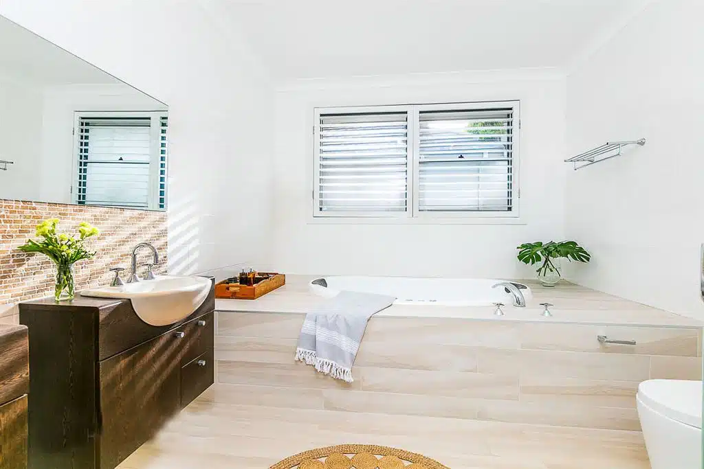 Modern bathroom renovation design by The School of Renovating