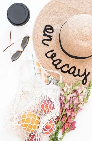 downsizer lifestyle essentials hat sunglasses and fresh produce