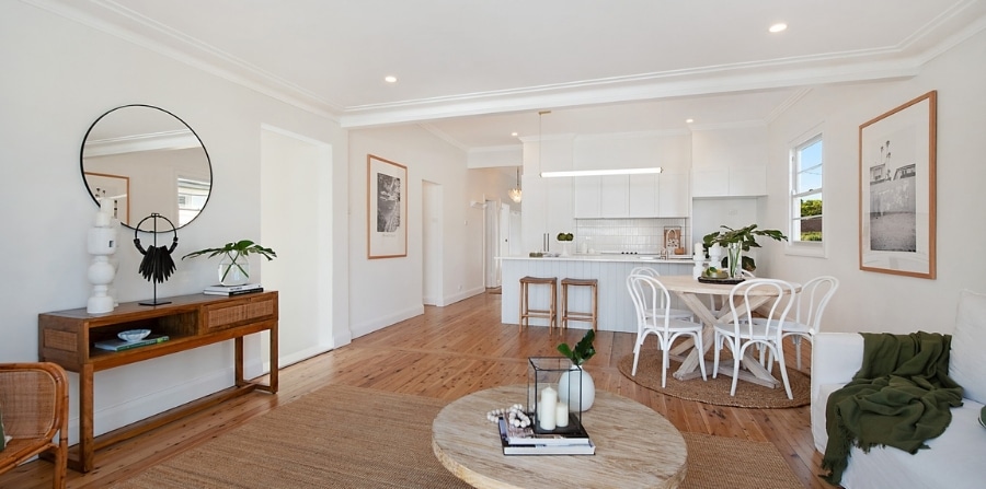 Interior of successful joint venture renovation showing modern open-plan design.