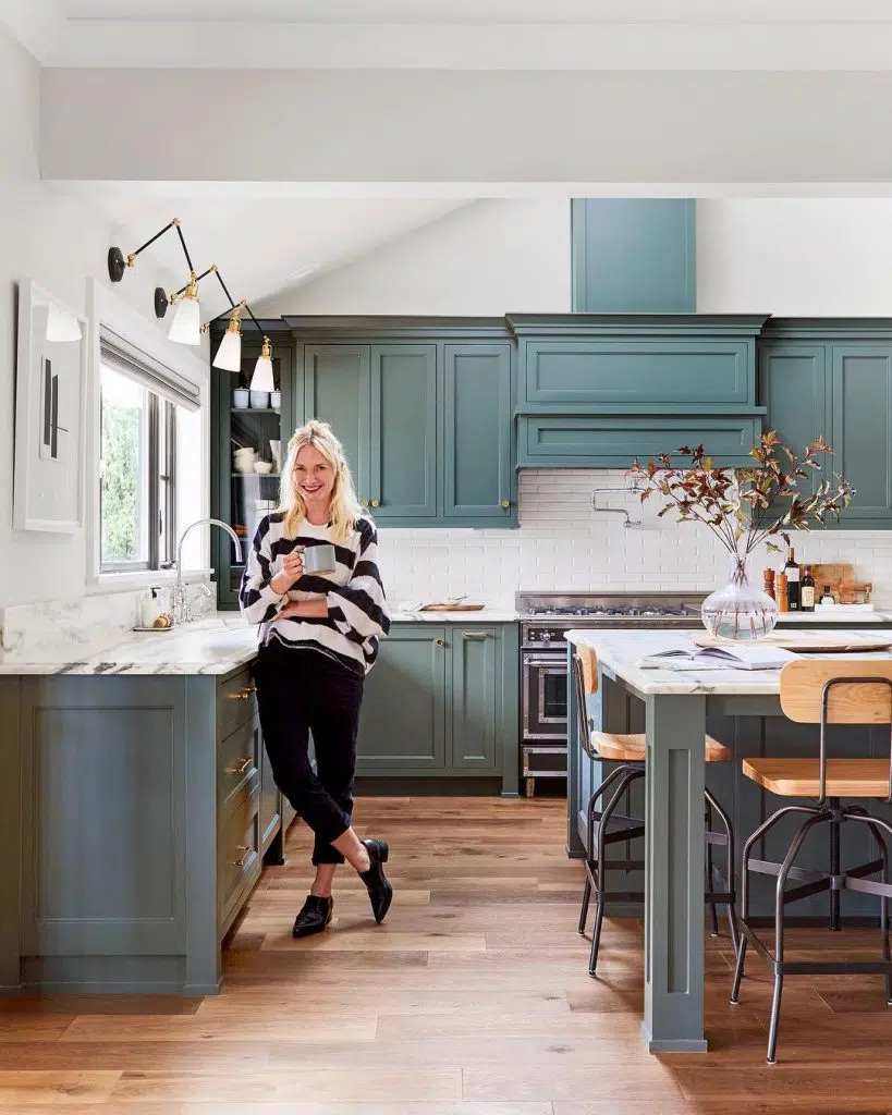 green kitchen renovation trend – modern cabinetry and marble countertop